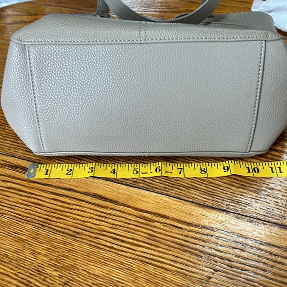 Taupe color leather tote.  Lots of pockets inside and out. - Picture 10 of 12